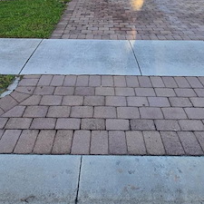 Pressure-Washing-Driveway-Oil-Stain-and-paint-removal-from-paver-driveway-located-at-Greenacres-FL-33415 1